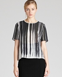Printed pieces instantly lift your wardrobe all year round. Team this abstract REISS top with black tailored trousers for a look with minimal styling requirements and add bold accents to further enliven the ensemble. Printed pieces instantly lift your wardrobe all year round. Team this abstract REISS top with black tailored trousers for a look with minimal styling requirements and add bold accents to further enliven the ensemble.