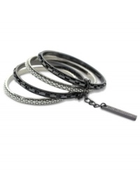 Stack up like crazy with this bracelet set by BCBGeneration. Four circular bangles create an edgy look in hematite tone and rhodium-tone mixed metal. Approximate diameter: 2-1/2 inches. Stack up like crazy with this bracelet set by BCBGeneration. Four circular bangles create an edgy look in hematite tone and rhodium-tone mixed metal. Approximate diameter: 2-1/2 inches.