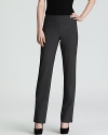 Sleek tailoring and classic styling make these Elie Tahari pants the foundation to your workweek style. Lengthen the slim silhouette with pointy-toe pumps.