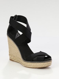 Wide espadrille wedge with comfortable elastic straps and leather logo detail at the ankle. Hemp-covered wedge, 4¾ (120mm)Hemp-covered platform, 1 (25mm)Compares to a 3¾ heel (95mm)Elastic upperRubber soleImportedOUR FIT MODEL RECOMMENDS ordering one half size up as this style runs small. Wide espadrille wedge with comfortable elastic straps and leather logo detail at the ankle. Hemp-covered wedge, 4¾ (120mm)Hemp-covered platform, 1 (25mm)Compares to a 3¾ heel (95mm)Elastic upperRubber soleImportedOUR FIT MODEL RECOMMENDS ordering one half size up as this style runs small.