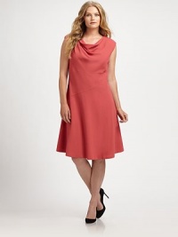 Made from an impeccable Italian fabrication, this sleeveless crepe dress offers a curve-complementing fit.Draped necklineSleevelessAsymmetrical seam detailsBack zipperFully linedAbout 28 from natural waist70% viscose/28% virgin wool/2% elastaneDry cleanImported of Italian fabric