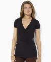 Lauren by Ralph Lauren's chic faux-wrap design in figure-flattering stretch jersey is accented with elegant pleats and a luxe woven-leather detail.