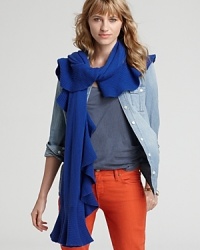 Rolling ruffles lend feminine inspiration to a cashmere Magaschoni scarf. Rolling ruffles lend feminine inspiration to a cashmere Magaschoni scarf.