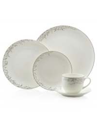 Sleek coupe dinnerware fringed with shimmering leaves of platinum and mica turns your table into a springtime utopia. Clean lines and whites create a vision of modern elegance in banded bone china place settings. Sleek coupe dinnerware fringed with shimmering leaves of platinum and mica turns your table into a springtime utopia. Clean lines and whites create a vision of modern elegance in banded bone china place settings.