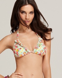 A whimsical floral print feels decidedly tropical on this Lilly Pulitzer bikini top. A whimsical floral print feels decidedly tropical on this Lilly Pulitzer bikini top.