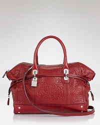 Dappled with hardware, Milly's go-with-everything satchel is a poised pick in buttery soft leather. Dappled with hardware, Milly's go-with-everything satchel is a poised pick in buttery soft leather.