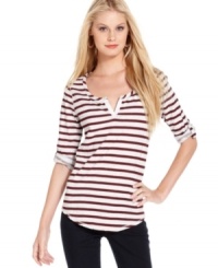 Inspired by a classic henley tee, Calvin Klein Jeans' striped top makes casual days a little chicer! Inspired by a classic henley tee, Calvin Klein Jeans' striped top makes casual days a little chicer!