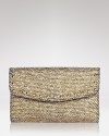 Elements of shimmer give this tweed Cornelia Guest clutch a touch of glitz that shines on when the ordinary evening bag just won't do.