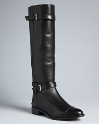Pour La Victoire polishes off these luxurious riding boots with buckled straps and cap toes. The result is a pair that will ride through many years to come. Pour La Victoire polishes off these luxurious riding boots with buckled straps and cap toes. The result is a pair that will ride through many years to come.