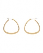 Snap up simple hoops with a trendy twist. These Kenneth Cole New York earrings feature a classic hoop style with an up-to-date shape. Crafted in worn gold tone mixed metal. Approximate diameter: 1 inch.