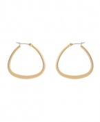 Snap up simple hoops with a trendy twist. These Kenneth Cole New York earrings feature a classic hoop style with an up-to-date shape. Crafted in worn gold tone mixed metal. Approximate diameter: 1 inch.