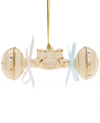 Shake, rattle and hang baby's first Christmas ornament from a branch that's in sight but out of reach! Hearts, stars and dots in fresh colors lend fun, youthful appeal to gold-trimmed ivory porcelain by Lenox. Shake, rattle and hang baby's first Christmas ornament from a branch that's in sight but out of reach! Hearts, stars and dots in fresh colors lend fun, youthful appeal to gold-trimmed ivory porcelain by Lenox.