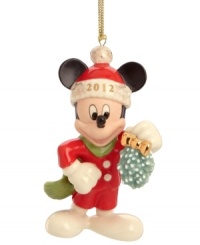 Mickey Mouse keeps a watchful eye for Minnie in this too-cute Christmas ornament featuring the iconic Disney character with a bouquet of mistletoe. Mickey Mouse keeps a watchful eye for Minnie in this too-cute Christmas ornament featuring the iconic Disney character with a bouquet of mistletoe.