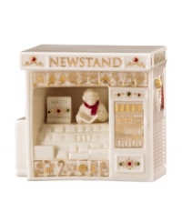 An essential part of holiday preparedness, the newstand is where Mistletoe Park residents go to read up on holiday decor, get ideas for a gourmet Christmas and buy milk for Santa's cookies. With incredible gold detail and trim in ivory porcelain. An essential part of holiday preparedness, the newstand is where Mistletoe Park residents go to read up on holiday decor, get ideas for a gourmet Christmas and buy milk for Santa's cookies. With incredible gold detail and trim in ivory porcelain.