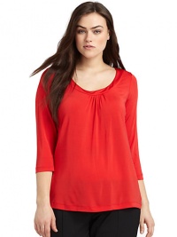 THE LOOKScoopneckThree-quarter length sleevesPullover styleTHE FITAbout 32 from shoulder to hemTHE MATERIAL93% viscose/7% elastaneCARE & ORIGINDry cleanImported THE LOOKScoopneckThree-quarter length sleevesPullover styleTHE FITAbout 32 from shoulder to hemTHE MATERIAL93% viscose/7% elastaneCARE & ORIGINDry cleanImported
