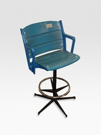 This authentic, legendary blue Yankee Stadium seat was pried from within baseball's cathedral in the Bronx and redesigned atop a wheeled base as a unique, sports-themed seat for the kitchen or home bar. Please note: each chair differs slightlyIncludes a certificate of authenticity77 lbs.24W X 43½H X 24LMade in USA