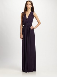 A stunning silhouette of draped stretch jersey, finished with a deep v at the bodice and beaded embroidery at the waist.V-neckSleevelessSet-in waistBack keyhole openingCenter back zipperAbout 50 from natural waist94% cupro/6% spandexDry cleanMade in USA of imported fabricModel shown is 5'11 (180cm) wearing US size Small. A stunning silhouette of draped stretch jersey, finished with a deep v at the bodice and beaded embroidery at the waist.V-neckSleevelessSet-in waistBack keyhole openingCenter back zipperAbout 50 from natural waist94% cupro/6% spandexDry cleanMade in USA of imported fabricModel shown is 5'11 (180cm) wearing US size Small.