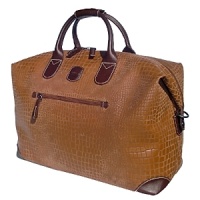 Constructed of a PVC coated with a special flock of cotton and viscose. Features vegetable tanned leather trim and polyester lining. Interior plain pocket. Constructed of a PVC coated with a special flock of cotton and viscose. Features vegetable tanned leather trim and polyester lining. Interior plain pocket.