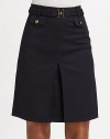 Nautical chic defined in a stretch wool twill A-line style with a braided belt and anchor-embossed button pockets.Wide waistband with belt loops Braided buckle belt Inverted center front pleat Back zipper About 20 long 95% wool/5% spandex; dry clean Imported