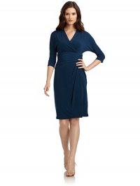 THE LOOKSurplice V-neckRuched waistbandMock wrap frontSide zip with hook-and-eye closureTHE FITAbout 39 from shoulder to hemTHE MATERIALPolyester/spandexFully linedCARE & ORIGINDry cleanImportedModel shown is 5'10 (177cm) wearing US size 4. THE LOOKSurplice V-neckRuched waistbandMock wrap frontSide zip with hook-and-eye closureTHE FITAbout 39 from shoulder to hemTHE MATERIALPolyester/spandexFully linedCARE & ORIGINDry cleanImportedModel shown is 5'10 (177cm) wearing US size 4.
