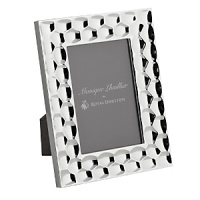 Atelier Metal Frames feature the elegant thumbprint design that brings modern texture to a classic design. This design will appeal to both feminine and masculine tastes making this the perfect collection for gifts or self-purchase. Atelier Metal Frames feature the elegant thumbprint design that brings modern texture to a classic design. This design will appeal to both feminine and masculine tastes making this the perfect collection for gifts or self-purchase.