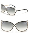 Tom Ford's chic oversized cross frames with openings at temple for a modern style.