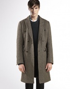 Basket weave, double-breasted overcoat with velvet detail under the collar.Front patch pocketsSingle back ventAbout 39.4 long84% wool/16% silkDry cleanMade in Italy