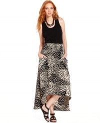 Get wild in DKNY Jeans' animal-print maxi skirt, featuring an asymmetrical hem for a flirty touch. Pair it with a black tank top and flat sandals for a no-fuss ensemble. Get wild in DKNY Jeans' animal-print maxi skirt, featuring an asymmetrical hem for a flirty touch. Pair it with a black tank top and flat sandals for a no-fuss ensemble.