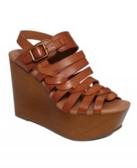 Weave a web of irresistible fashion. The Rosemary sandals by Lucky Brand are the ultimate accessory for feminine skirts and worn-in flares with their faux wood covered wedge and woven straps. Weave a web of irresistible fashion. The Rosemary sandals by Lucky Brand are the ultimate accessory for feminine skirts and worn-in flares with their faux wood covered wedge and woven straps.