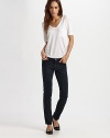 Slim, straight-leg denim in a chic, slightly cropped silhouette.THE FITFitted through hips and thighsMedium rise, about 7¼Inseam, about 30THE DETAILSZip flyFive-pocket style80% cotton/15% modal/5% polyurethaneMachine washMade in USA of imported fabricModel shown is 5'10½ (179cm) wearing US size 4.