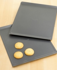 Put away that spatula... your cookies will slide right off these durable, aluminized steel sheets. Designed with nonstick surfaces inside and out, you'll enjoy quick release of baked goods and easy cleanup. Lifetime warranty. Put away that spatula... your cookies will slide right off these durable, aluminized steel sheets. Designed with nonstick surfaces inside and out, you'll enjoy quick release of baked goods and easy cleanup. Lifetime warranty.