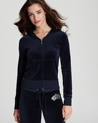 Glam up your weekend wardrobe with this Juicy Couture hoodie, finished with a rhinestone-encrusted logo for shameless diva appeal. Glam up your weekend wardrobe with this Juicy Couture hoodie, finished with a rhinestone-encrusted logo for shameless diva appeal.
