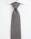 A distinguished silk tie with an irresistible print.SilkDry cleanMade in Italy