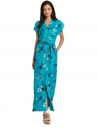 THE LOOKHawaiian printNotch lapelFront button closure Vented short sleevesChest button flap pocketsSelf-tie beltSide seam pocketsVented hemTHE FITAbout 58 from shoulder to hemTHE MATERIALSilkCARE & ORIGINDry cleanImportedModel shown is 5'10 (177cm) wearing US size Small. THE LOOKHawaiian printNotch lapelFront button closure Vented short sleevesChest button flap pocketsSelf-tie beltSide seam pocketsVented hemTHE FITAbout 58 from shoulder to hemTHE MATERIALSilkCARE & ORIGINDry cleanImportedModel shown is 5'10 (177cm) wearing US size Small.