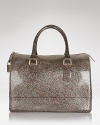 Furla redefines arm candy with this satchel. A sweet daytime touch, it's crafted of rubber with a distinctive shape.