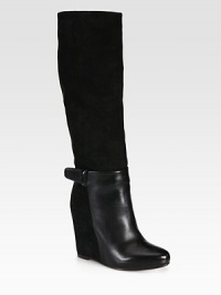 A sleek suede and leather design with lots of attitude, lifted by a substantial wedge.Suede-covered wedge, 4½ (115mm)Leather-covered platform, 1 (25mm)Compares to a 3½ heel (90mm)Shaft, 15½Leg circumference, 13½Leather and suede upperTab detailLeather lining and solePadded insoleMade in ItalyThis style runs true to size. We recommend ordering your usual size for a standard fit. A sleek suede and leather design with lots of attitude, lifted by a substantial wedge.Suede-covered wedge, 4½ (115mm)Leather-covered platform, 1 (25mm)Compares to a 3½ heel (90mm)Shaft, 15½Leg circumference, 13½Leather and suede upperTab detailLeather lining and solePadded insoleMade in ItalyThis style runs true to size. We recommend ordering your usual size for a standard fit.
