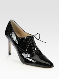 Critically acclaimed patent leather oxford, rejuvenated by a signature point toe and skinny heel. Stacked heel, 3½ (90mm)Patent leather upperLeather lining and solePadded insoleMade in ItalyOUR FIT MODEL RECOMMENDS ordering one size up as this style runs small. Critically acclaimed patent leather oxford, rejuvenated by a signature point toe and skinny heel. Stacked heel, 3½ (90mm)Patent leather upperLeather lining and solePadded insoleMade in ItalyOUR FIT MODEL RECOMMENDS ordering one size up as this style runs small.