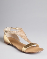 Forget the flip flops and sparkle in these glittering metallic sandals from Boutique 9; they lend even the dressiest looks appeal and add a does of glam to casual styles. Ultra-versatile, they are the perfect pair for your upcoming getaway. Forget the flip flops and sparkle in these glittering metallic sandals from Boutique 9; they lend even the dressiest looks appeal and add a does of glam to casual styles. Ultra-versatile, they are the perfect pair for your upcoming getaway.
