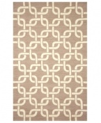 Chain-link chic! Liora Manne combines hand-hooking and hand-tufting techniques to achieve the rich, textural surface of this oatmeal and ivory-hued indoor/outdoor rug from the Promenade collection. UV stabilized to minimize fading, the elegant and durable rug is sure to please. Hose off for easy cleaning.
