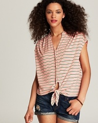 This tie-front Red Haute top can be worn a myriad of ways. Rock it resort-style with swimswear and cut-offs or over a slim fitting turtleneck when summer turns to fall. This tie-front Red Haute top can be worn a myriad of ways. Rock it resort-style with swimswear and cut-offs or over a slim fitting turtleneck when summer turns to fall.