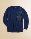 Wishing on a star is easy when she's wearing this cozy cardigan with hi-lo hem and an out-of-this-world embellishment.CrewneckLong sleevesButton-frontHi-lo hem60% rayon/40% cottonMachine washImported Please note: Number of buttons may vary depending on size ordered. 