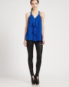 Cowlneck-inspired ruffle detail sweetens this silk racerback tank. Ruffle-trim v-neckWide strapsRacerbackSilkDry cleanImportedModel shown is 5'9½ (176cm) wearing US size Small.