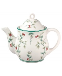 A classic holly print with raised detail and green banding makes the Pfaltzgraff Winterberry teapot a festive companion to the holiday table. A classic holly print with raised detail and green banding makes the Pfaltzgraff Winterberry teapot a festive companion to the holiday table.