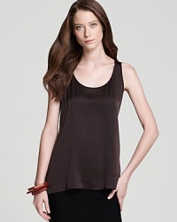A decadent shade infuses this Eileen Fisher top with everyday elegance. Slip the style under a blazer for office chic, or brandish it with a chunky necklace for after-hours appeal. A decadent shade infuses this Eileen Fisher top with everyday elegance. Slip the style under a blazer for office chic, or brandish it with a chunky necklace for after-hours appeal.