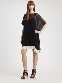 An ultra-mod sheath of colorblocked matte silk draped elegantly from shoulder to hem.BoatneckDropped shouldersDolman sleevesAsymmetrical hemAbout 21 from natural waistSilkDry cleanImportedModel shown is 5'9½ (176cm) wearing US size Small.OUR FIT MODEL RECOMMENDS ordering true size. An ultra-mod sheath of colorblocked matte silk draped elegantly from shoulder to hem.BoatneckDropped shouldersDolman sleevesAsymmetrical hemAbout 21 from natural waistSilkDry cleanImportedModel shown is 5'9½ (176cm) wearing US size Small.OUR FIT MODEL RECOMMENDS ordering true size.
