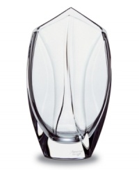 This elegant vase is small and striking and takes its shape from the inspiring look of a flower bud. In substantial, carefully crafted handmade crystal from Baccarat, with subtle curving waves of thickness along the sides and a mouth that comes to two gentle points, this vase is simply exquisite. This elegant vase is small and striking and takes its shape from the inspiring look of a flower bud. In substantial, carefully crafted handmade crystal from Baccarat, with subtle curving waves of thickness along the sides and a mouth that comes to two gentle points, this vase is simply exquisite.