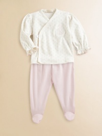 Dainty embroidery, polka dots and ruffles trim the top while a solid color styles the footed pants.V-neckLong sleeves with ruffled cuffsFront crossover snapsElastic waistPima cottonMachine washImported Please note: Number of snaps may vary depending on size ordered. Dainty embroidery, polka dots and ruffles trim the top while a solid color styles the footed pants.V-neckLong sleeves with ruffled cuffsFront crossover snapsElastic waistPima cottonMachine washImported Please note: Number of snaps may vary depending on size ordered.