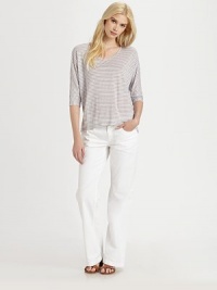 Stylish stripes adorn this linen top with modern, three-quarter sleeves and an ultra-feminine, curved hem.U-neckThree-quarter sleevesAllover stripesCurved hemAbout 24 from shoulder to hemLinenHand washImported Model shown is 5'10 (177cm) wearing US size Small. Stylish stripes adorn this linen top with modern, three-quarter sleeves and an ultra-feminine, curved hem.U-neckThree-quarter sleevesAllover stripesCurved hemAbout 24 from shoulder to hemLinenHand washImported Model shown is 5'10 (177cm) wearing US size Small.
