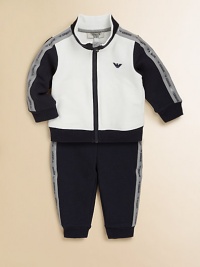 A cozy, zip-front jacket with logo tape detailing tops a pair of matching track pants for sporty style. Jacket Stand collarLong sleevesZip-frontRibbed hem and cuffs Pants Elastic waistbandRibbed hem92% cotton/8% elastaneDry cleanImported A cozy, zip-front jacket with logo tape detailing tops a pair of matching track pants for sporty style. Jacket Stand collarLong sleevesZip-frontRibbed hem and cuffs Pants Elastic waistbandRibbed hem92% cotton/8% elastaneDry cleanImported