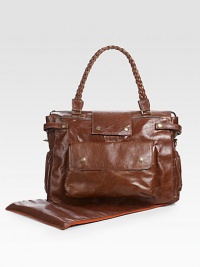 Long after baby has grown you'll still be carrying this elegant bag in light, soft leather with an outer zip pocket, snap flap pocket, 2 open bottle pockets on each side, water-resistant lining with 1 zip and 3 open pockets, plus a matching changing pad.Two braided top handles, 8½ drop Detachable shoulder strap Top zip closure 12H X 16W X 6D Made in USA Long after baby has grown you'll still be carrying this elegant bag in light, soft leather with an outer zip pocket, snap flap pocket, 2 open bottle pockets on each side, water-resistant lining with 1 zip and 3 open pockets, plus a matching changing pad.Two braided top handles, 8½ drop Detachable shoulder strap Top zip closure 12H X 16W X 6D Made in USA